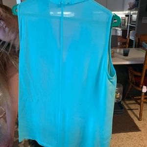 Ladies teal sleeveless dress shirt, size 10,  Brand name "etcetera"